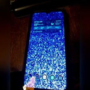 Samsung A32 Boost mobile phone and case